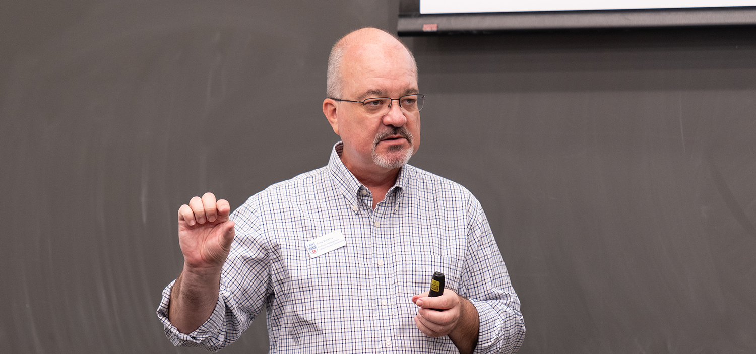 A professor leading a class lecture.